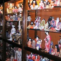 a collection of porcelain dolls